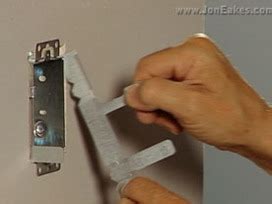 metal tabs to hold a loode electric box|Single box with bendable tabs.